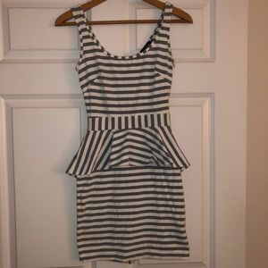 bebe Gray & White stripe mid thigh peplum dress.